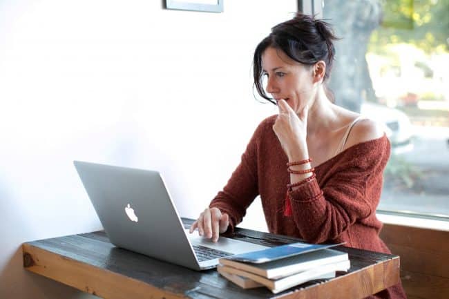 woman checking on her laptop