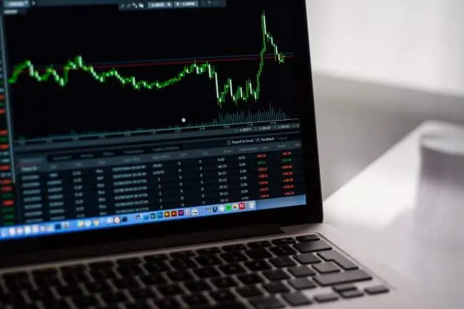 Laptop with stock market chart